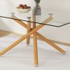A table with four chairs. Glass dining table with 0.39 "tempered glass tabletop and wooden metal legs. PU leather high backrest cushioned side chair w